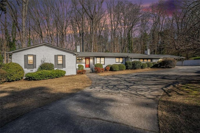 view of front of house with a carport