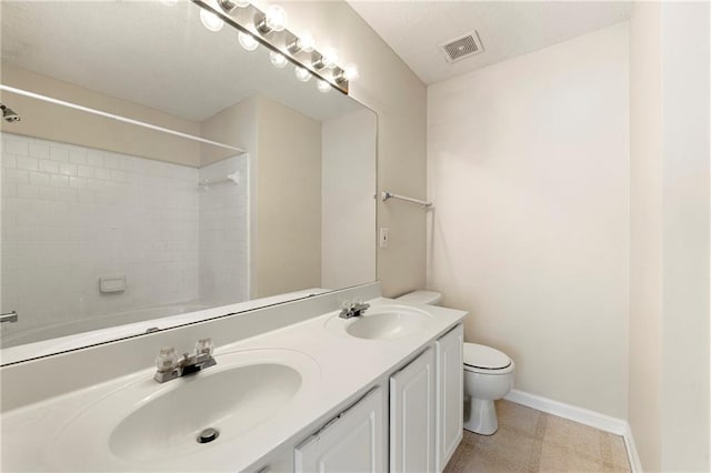 4100 Howell Park Rd, Duluth, GA 30096 - bathroom with baseboards, toilet, and double vanity