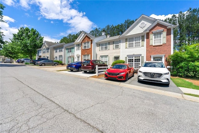 4100 Howell Park Rd, Duluth, GA 30096 - view of front of house with uncovered parking and a residential view