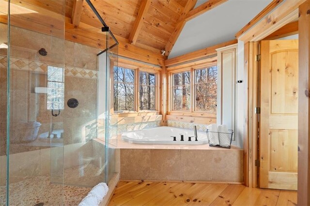 bathroom featuring wooden ceiling, independent shower and bath, wood-type flooring, and lofted ceiling with beams