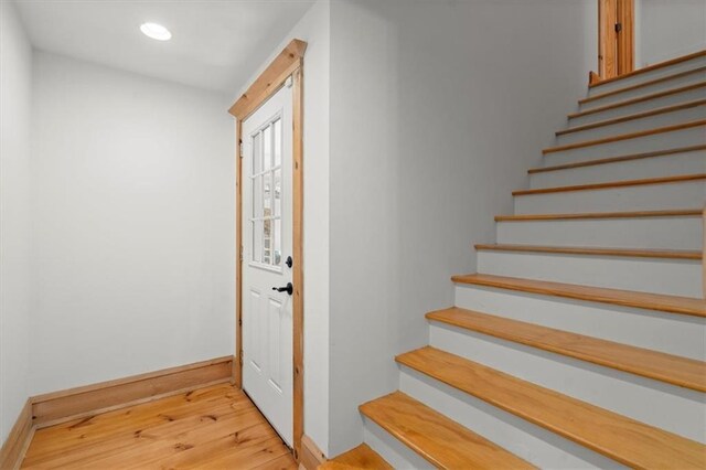 interior space with wood ceiling, ceiling fan, and beamed ceiling