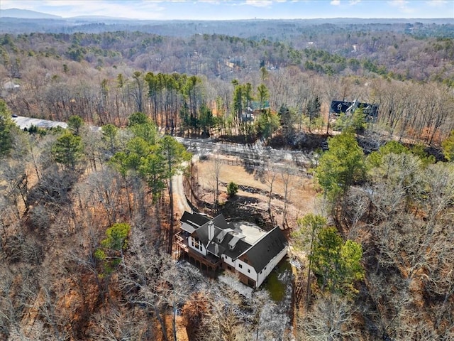 bird's eye view with a view of trees