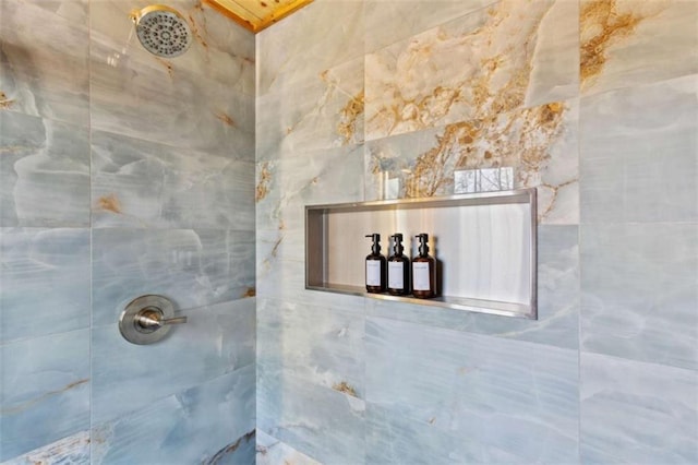 bathroom view of tiled shower