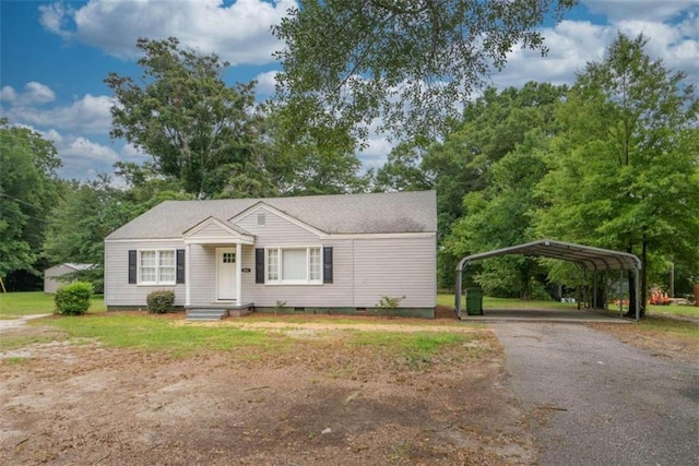 view of front of house featuring a carport