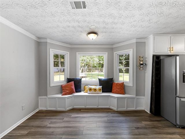 30 Court S, Ellenwood, GA 30294 - unfurnished room with dark wood-style flooring, ornamental molding, and a textured ceiling