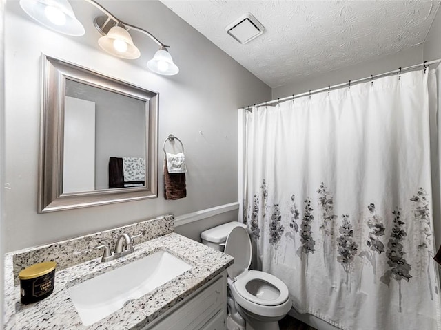 30 Court S, Ellenwood, GA 30294 - bathroom featuring vanity, a textured ceiling, and a shower with curtain