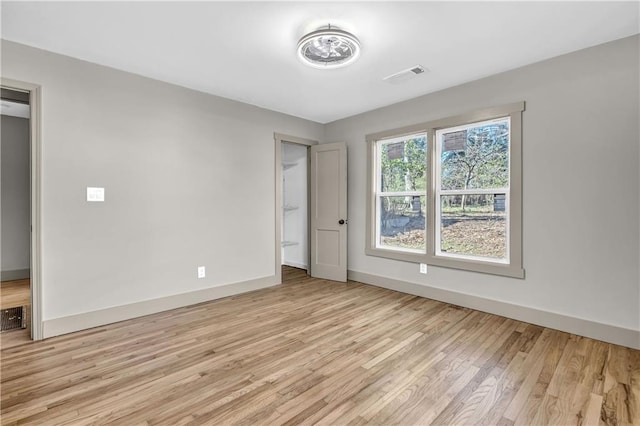 unfurnished bedroom featuring light hardwood / wood-style floors