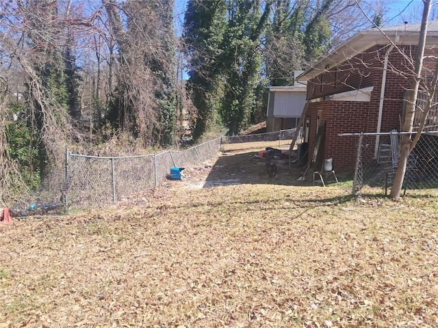 view of yard featuring fence