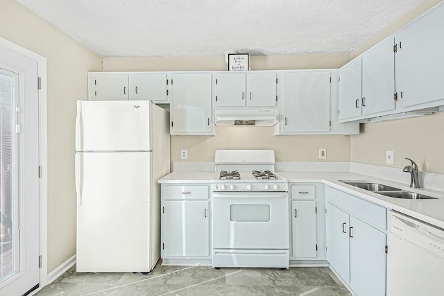 kitchen with white cabinetry, sink, and white appliances