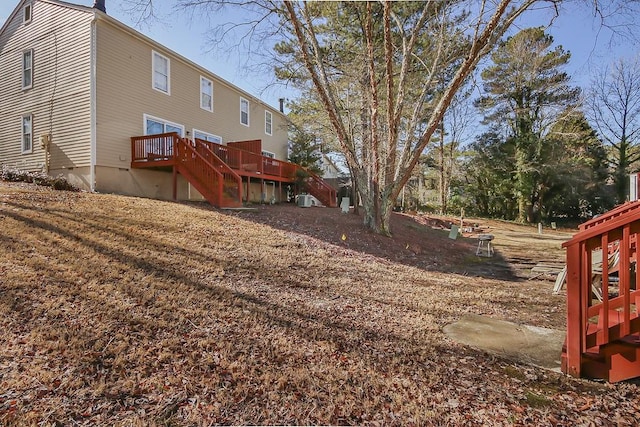 view of yard with a wooden deck