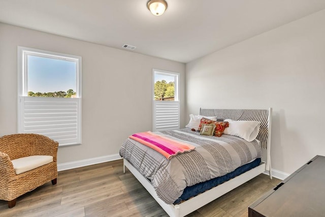 259 Dunagan Ct, Winder, GA 30680 - bedroom with wood finished floors and baseboards