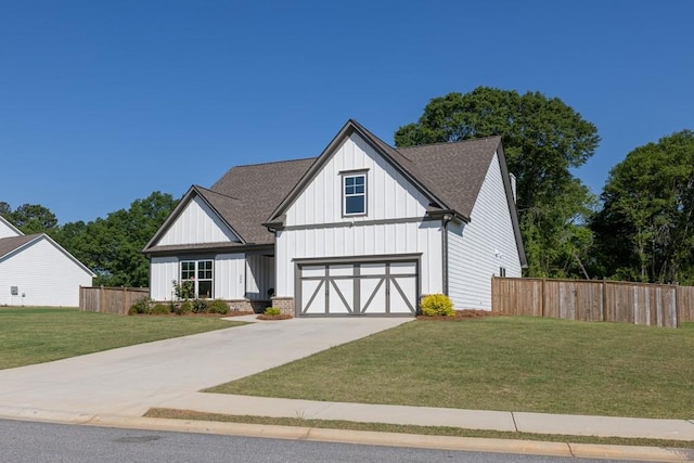 259 Dunagan Ct, Winder, GA 30680 - modern farmhouse style home featuring board and batten siding, concrete driveway, roof with shingles, and a garage