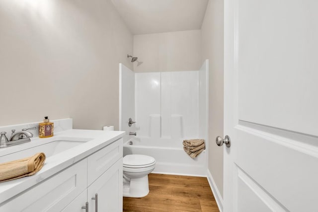 259 Dunagan Ct, Winder, GA 30680 - full bathroom with wood finished floors, vanity, and bathing tub / shower combination
