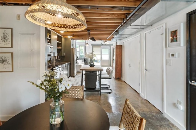 1661 La France St NE Unit 222, Atlanta, GA 30307 - dining room featuring concrete flooring