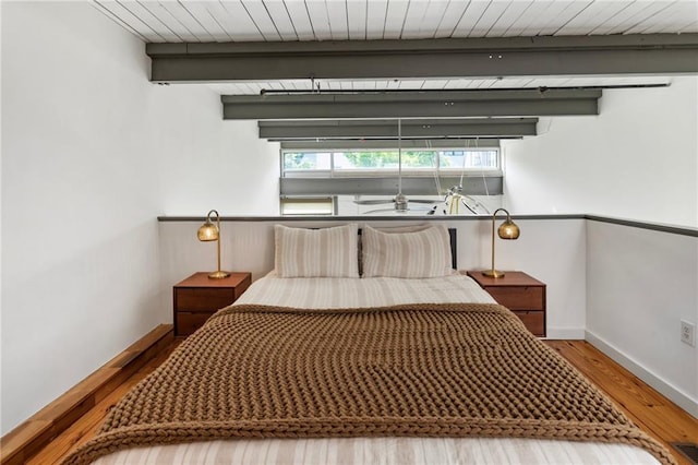 1661 La France St NE Unit 222, Atlanta, GA 30307 - bedroom with wood finished floors and a wooden ceiling with exposed beams
