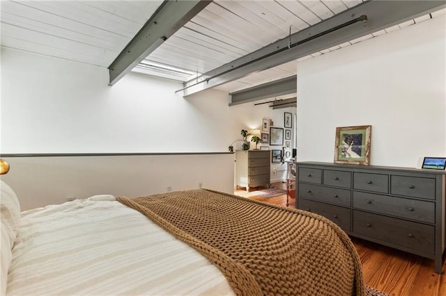 1661 La France St NE Unit 222, Atlanta, GA 30307 - bedroom with beamed ceiling and wood finished floors
