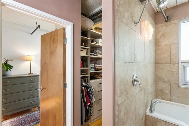 1661 La France St NE Unit 222, Atlanta, GA 30307 - full bathroom with a walk in closet and tiled shower / bath combo