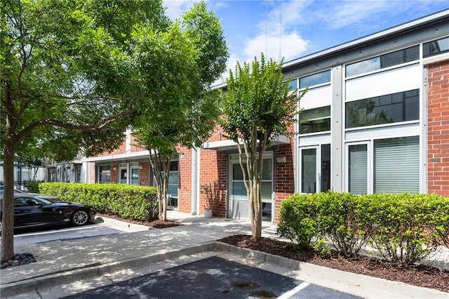 1661 La France St NE Unit 222, Atlanta, GA 30307 - view of property with uncovered parking