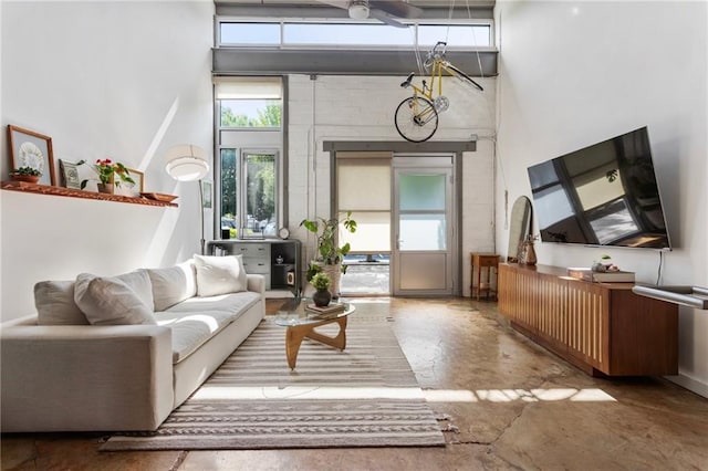 1661 La France St NE Unit 222, Atlanta, GA 30307 - living area with concrete flooring and a towering ceiling
