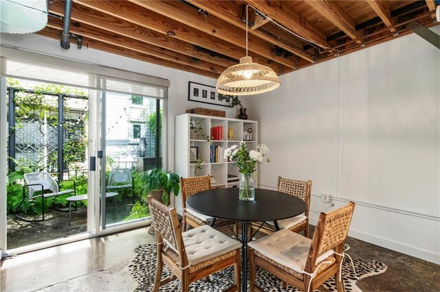 1661 La France St NE Unit 222, Atlanta, GA 30307 - dining space featuring concrete floors