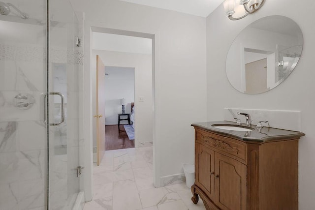 bathroom featuring vanity, toilet, hardwood / wood-style floors, and a shower with shower door