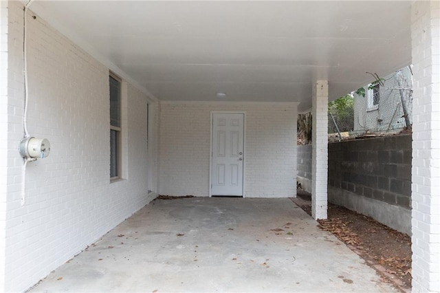 view of patio / terrace featuring an attached carport