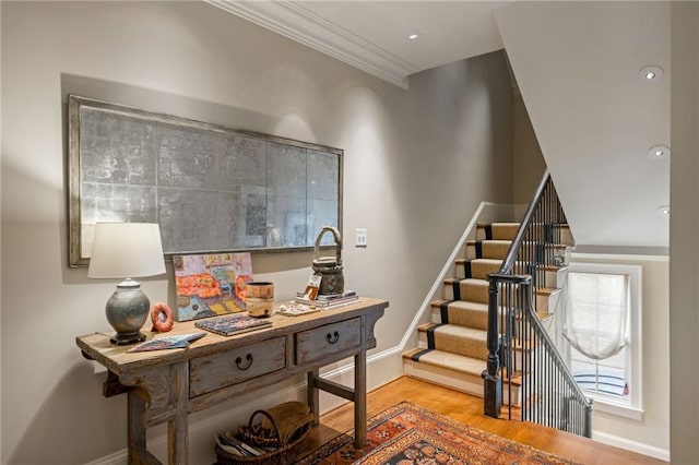 92 Old Ivy Rd NE Unit 6, Atlanta, GA 30342 - stairway featuring ornamental molding, wood finished floors, and recessed lighting