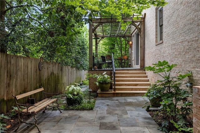 92 Old Ivy Rd NE Unit 6, Atlanta, GA 30342 - fenced backyard with a pergola and a patio area