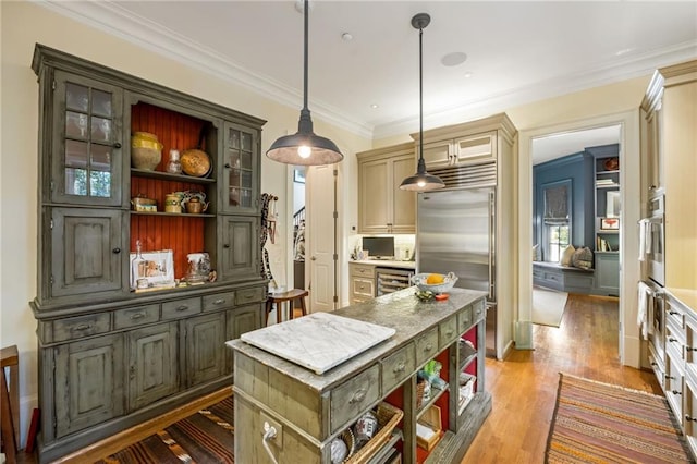 92 Old Ivy Rd NE Unit 6, Atlanta, GA 30342 - kitchen featuring open shelves, built in refrigerator, a kitchen island, ornamental molding, and wine cooler