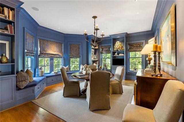 92 Old Ivy Rd NE Unit 6, Atlanta, GA 30342 - dining room featuring crown molding, wood finished floors, a chandelier, and built in shelves