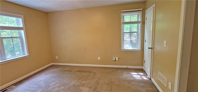 view of carpeted spare room