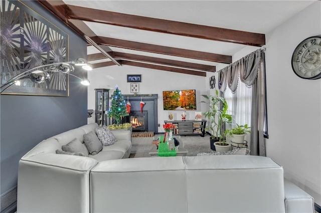 living room featuring vaulted ceiling with beams