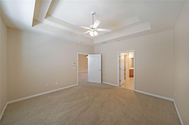 223 Glens Loop, Woodstock, GA 30188 - unfurnished bedroom with a raised ceiling, light colored carpet, baseboards, and ensuite bath