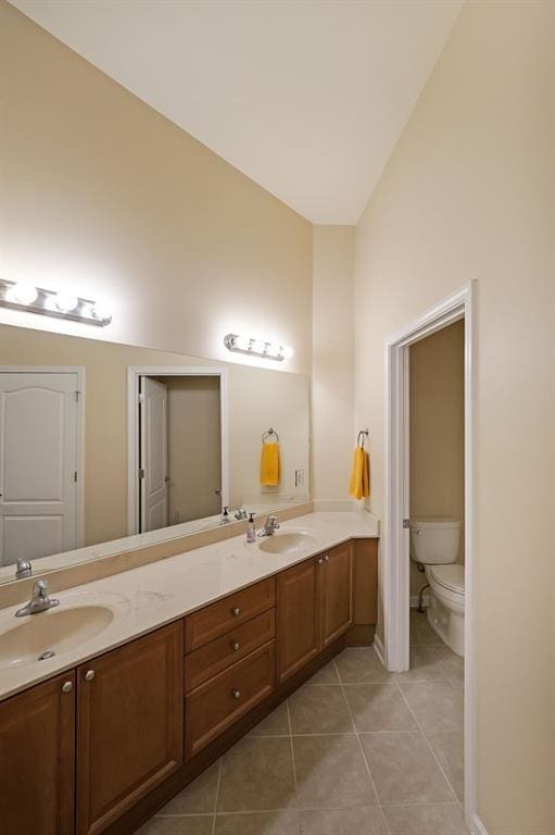 223 Glens Loop, Woodstock, GA 30188 - full bath with tile patterned floors, toilet, double vanity, and baseboards