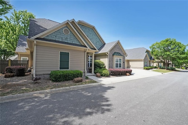 223 Glens Loop, Woodstock, GA 30188 - view of front of house with a shingled roof and concrete driveway