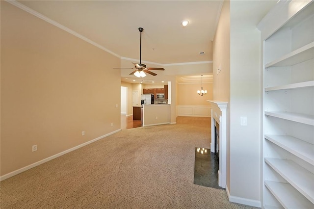 223 Glens Loop, Woodstock, GA 30188 - unfurnished living room featuring a ceiling fan, crown molding, light carpet, a fireplace, and baseboards