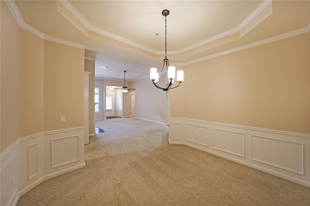 223 Glens Loop, Woodstock, GA 30188 - carpeted spare room with a raised ceiling, a chandelier, wainscoting, crown molding, and ceiling fan