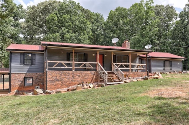 ranch-style home featuring a front yard and a porch