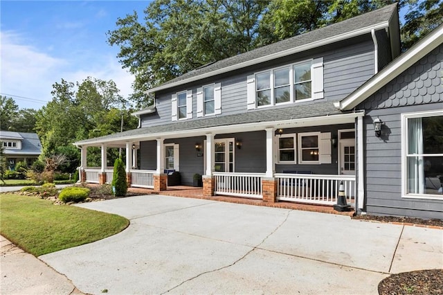 view of front of property featuring covered porch