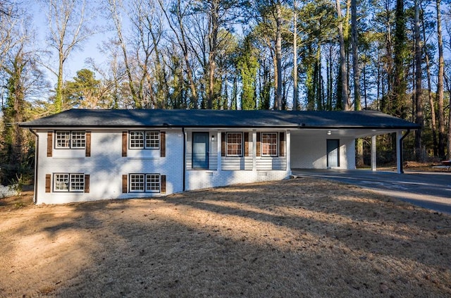 view of front facade featuring a carport