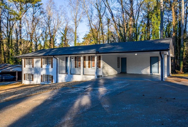 view of front of house with a carport