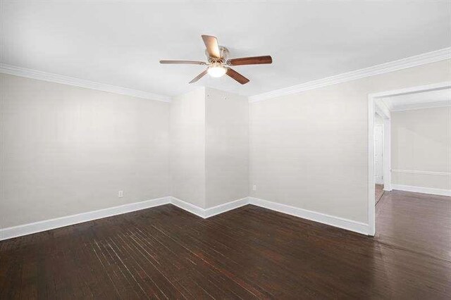 spare room with ceiling fan, dark hardwood / wood-style flooring, and ornamental molding