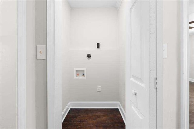 laundry area featuring washer hookup and hardwood / wood-style flooring