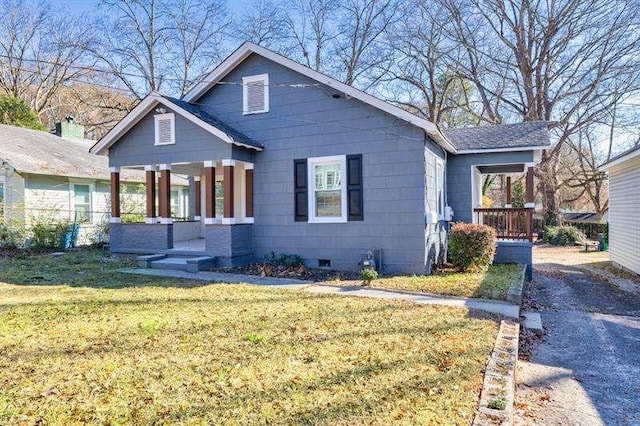 view of front of home featuring a front lawn and a porch