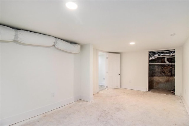 finished below grade area with recessed lighting and baseboards