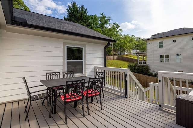 deck featuring fence and outdoor dining area