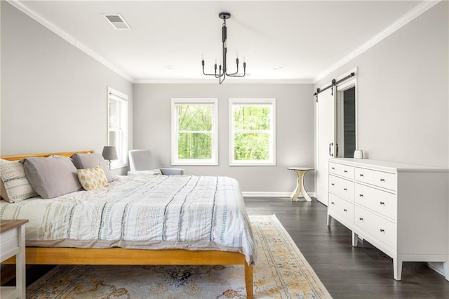 bedroom with visible vents, crown molding, a barn door, baseboards, and dark wood-type flooring