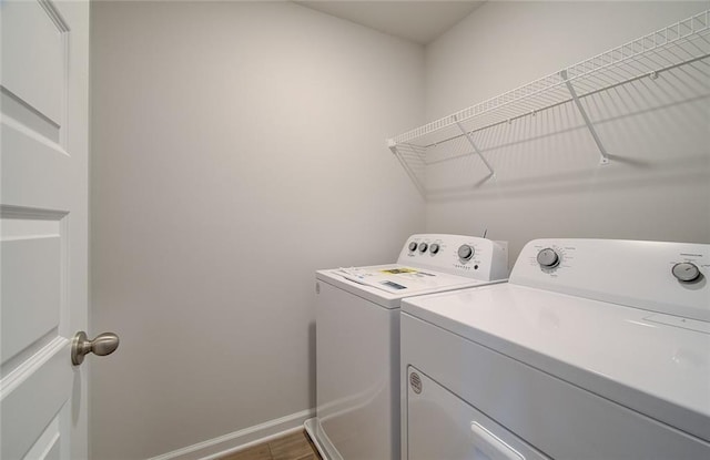 laundry area featuring independent washer and dryer