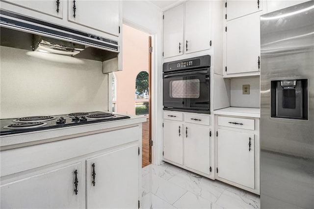 kitchen featuring black appliances, white cabinets, light countertops, under cabinet range hood, and marble finish floor