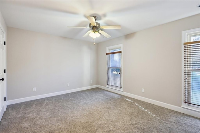 unfurnished bedroom featuring ceiling fan and light colored carpet